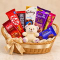 Golden Celebration chocolate gift basket with 7 packs and ivory teddy